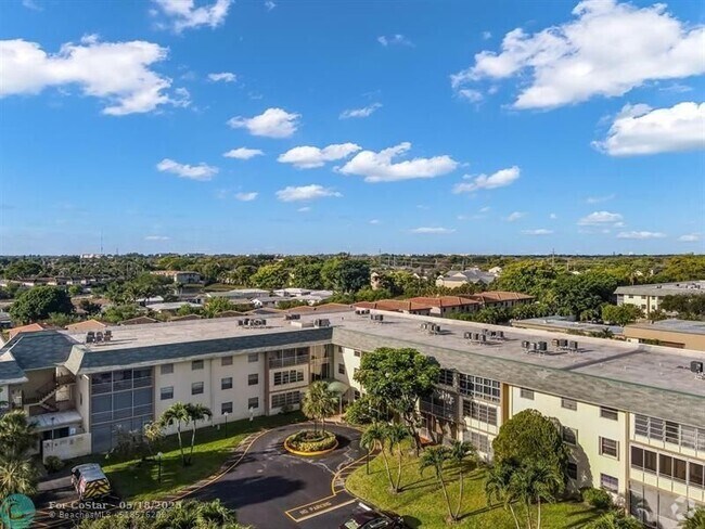 Building Photo - 4990 E Sabal Palm Blvd Unit 204 Rental