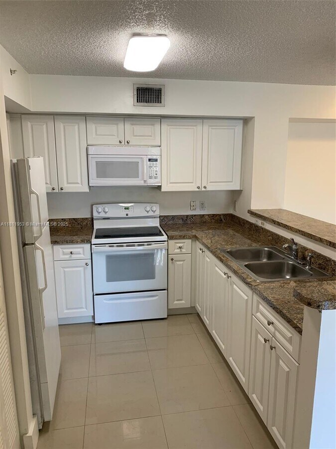 Photo - 5825 W 25th Ct Condo Unit 211