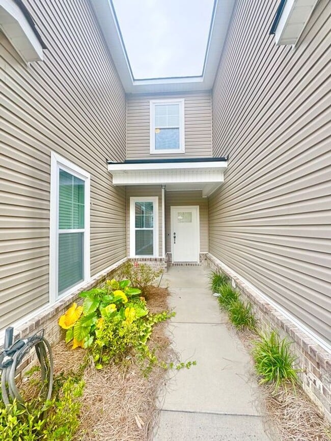 Photo - Welcome to this stunning 3-bedroom, 3-bathroom townhome located in the desirable Berkley Walk sub...