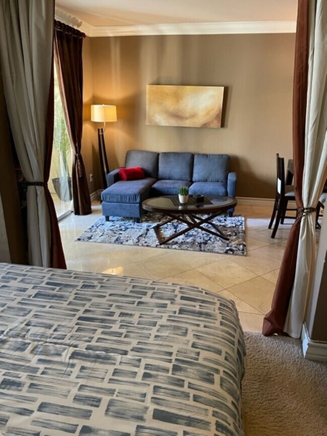 Photo - Meridian STUDIO Condo Fully Furnished near Main Pool-Lush Green trees in Resort Style Community.
