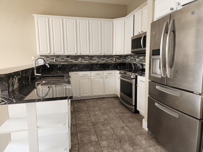 Photo - Hunters Creek Home with Fenced Back Yard in Guard-Gated Golf Community