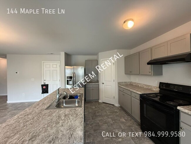 Photo - 144 Maple Tree Ln