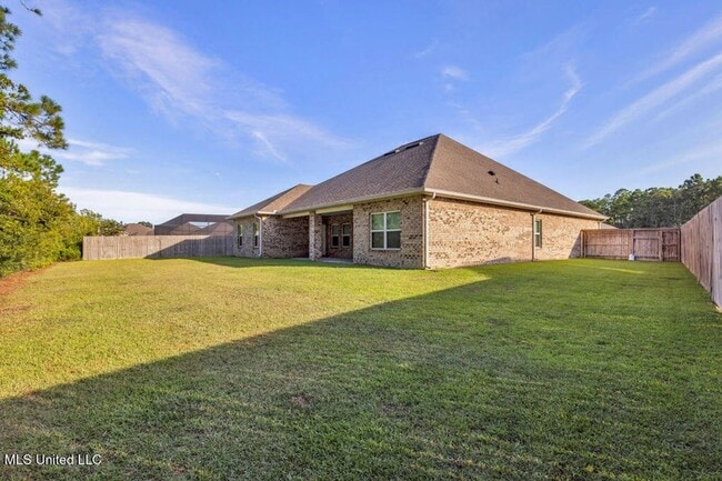 Photo - | 3,100+ Sq Ft • Gourmet Kitchen • Covered Patio • Ocean Springs Schools