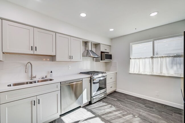 Photo - Welcome to this stunning 3-bedroom, 2-bath, single-story home that has been completely renovated ...