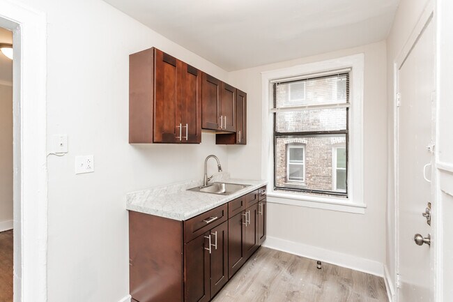 Photo - 6949 S Paxton Ave Condo Unit 3E