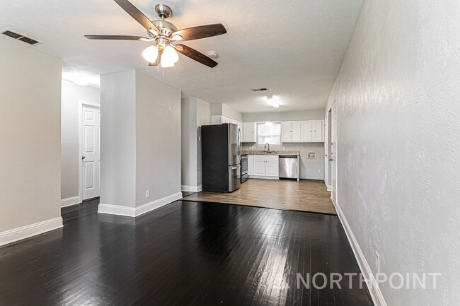 Photo - 3 BR/1BA | Newly Renovated Single Family Home | 1-Car Garage Parking | Gated backyard