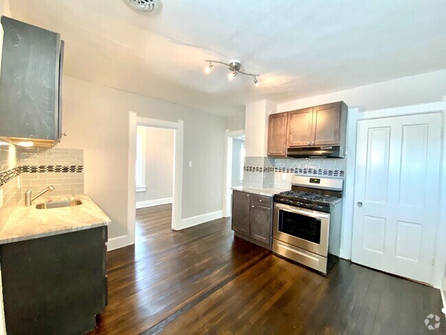Building Photo - 1207 E Kane Pl Unit Upper Rental