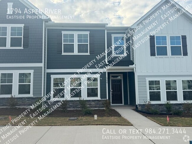 Building Photo - New Two-story Townhome! Tons of amenities!...