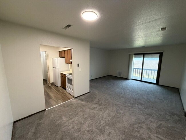 Photo - MOVE-IN Ready - 2 bedroom, One Bath - Top Floor with Private balcony and Central A/C! Unit 30