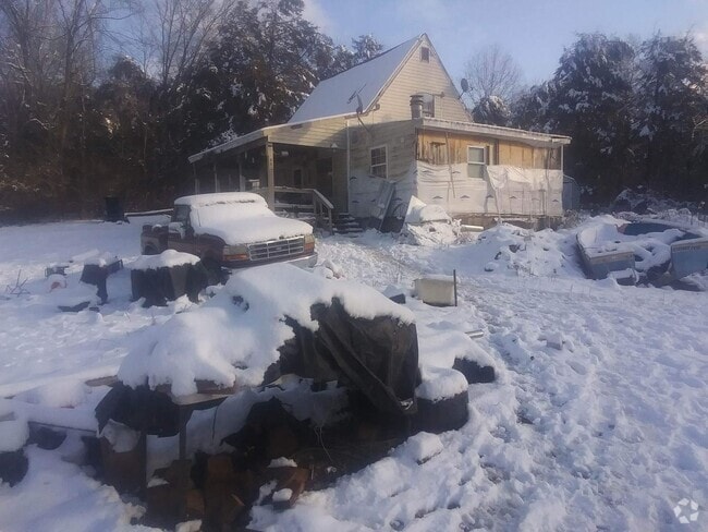 Building Photo - ELDON - 2 Bd, 1.5 Ba Fixer Upper - ONLY $8... Rental