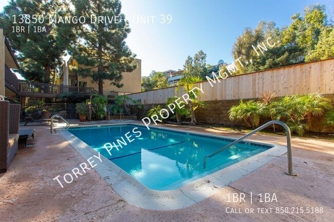 Building Photo - 13850 Mango Dr Unit 39