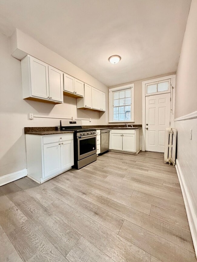 Photo - Huge townhome available. Four bedrooms three bath.