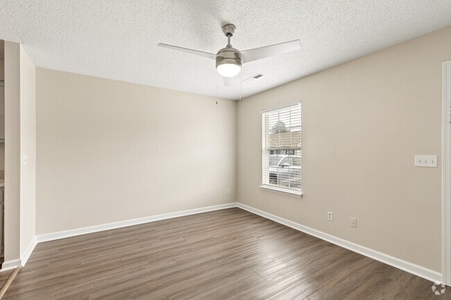 1BR, 1BA - 600SF - Living Room - The Villages at Fort Town Apartments