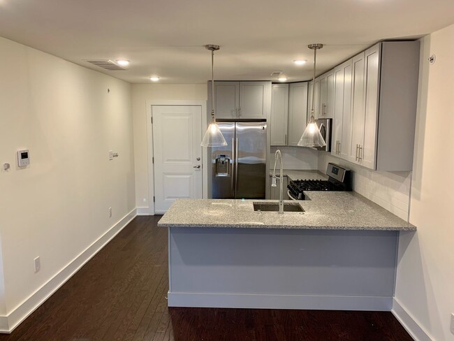 Photo - Stunning 2-Bed Condo with Private Roof Deck in Norris Square! Available mid-July! Unit 3