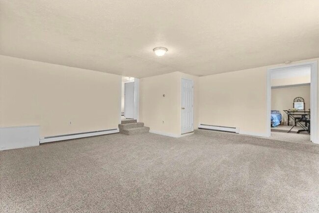 Living area - fresh wall to wall carpet - 333 Groveland St Unit 3