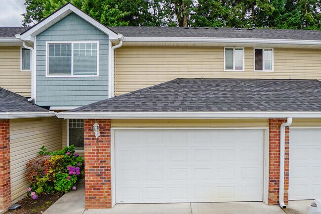 THREE BEDROOM TOWNHOME WITH GARAGE ACROSS FROM SHOPPING AND DINING