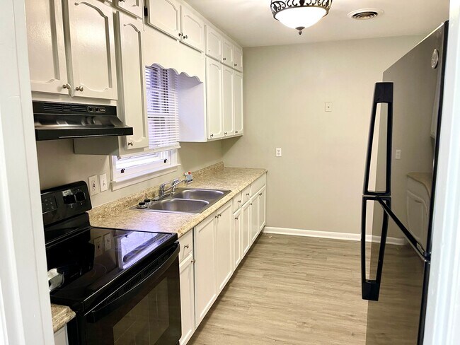 Photo - Welcome to this charming 4 bedroom, 2 bath...