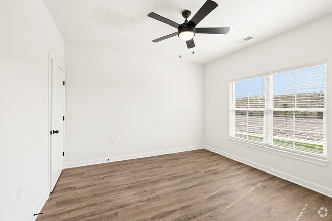 2BR, 2BA - 1,052SF - Primary Bedroom