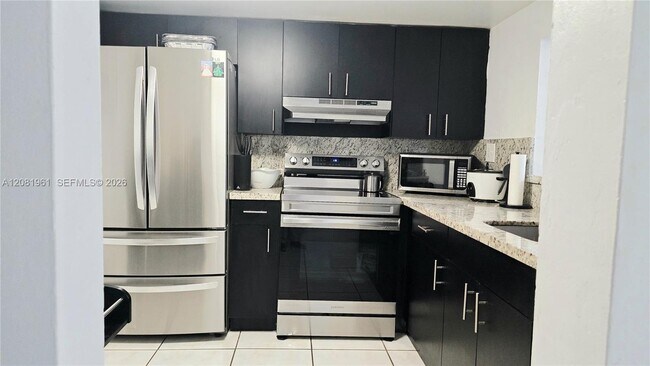 11259 SW 88th St Unit 104H