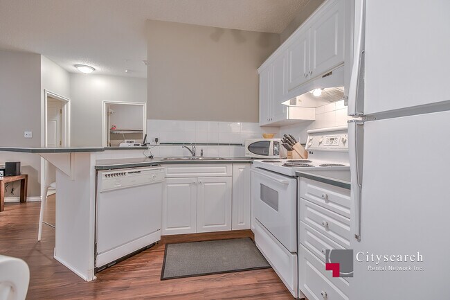 Photo - 777-777 3 Ave SW