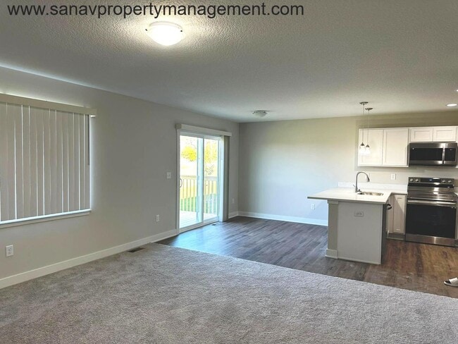 Photo - "Charming Family Living: 3BR, 2BA Home Steps Away from High School, Triumph Park, and Sugar Creek...