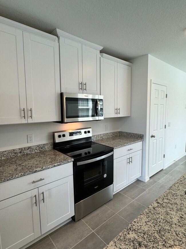 Photo - 3 Bedroom 2 Bath with Double Car Garage in Poinciana!