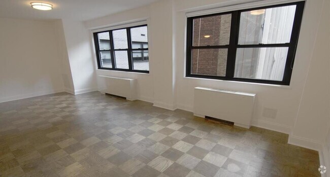 Building Photo - 145 E 16th St Unit 14T Rental