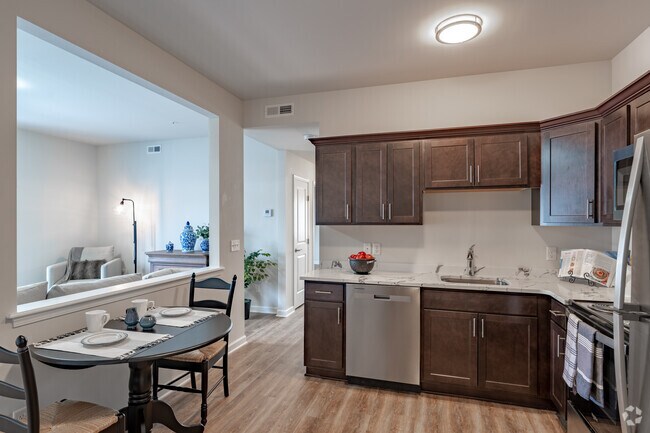 2BR, 1BA - 912SF - Kitchen and Dining Area