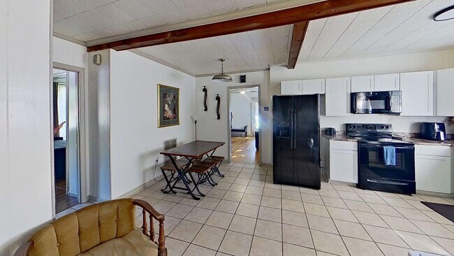 Photo - Renovated 3-Bedroom Home – Furnished or Un...