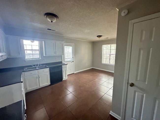 Photo - MOVE-IN READY! 3BR/2BA in Quiet Cove | Brick Fireplace | Fenced Yard & Patio!