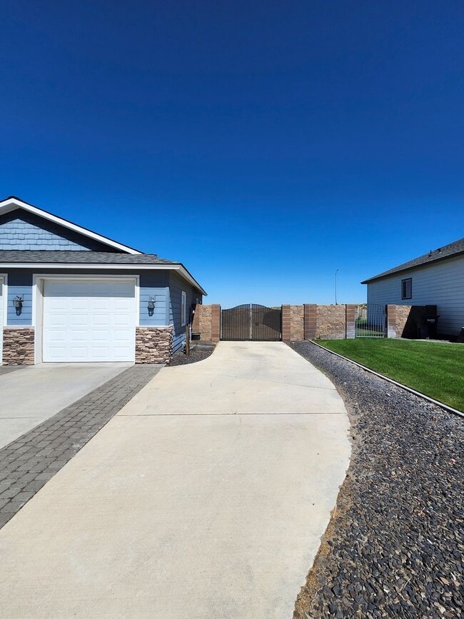 Photo - Beautiful 3 bedroom w/3 Car Garage and Additional RV/Trailer Parking