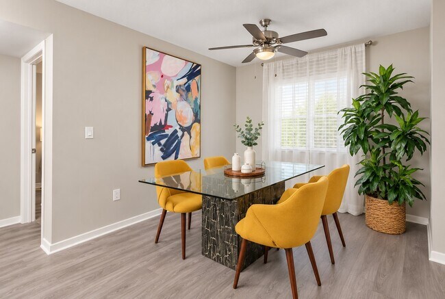 Elevate your lifestyle at Club Mira Lago with this chic dining area, featuring modern furnishings and vibrant accents. Perfect for gatherings or intimate meals. Explore your new home today and envision your future in style!