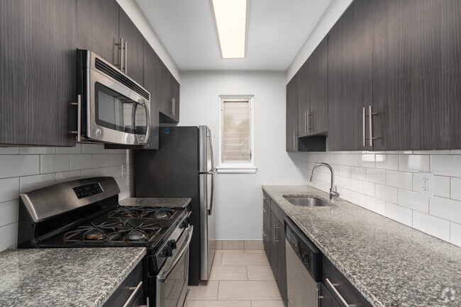 2BR, 1BA - 768SF - Kitchen - Montgomery Court