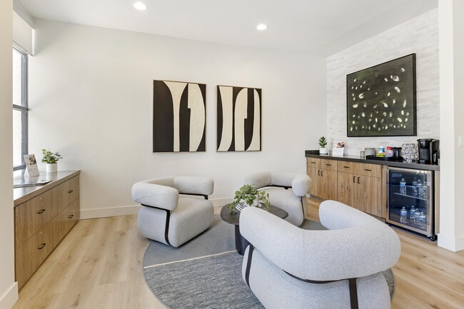 Our leasing office offers a cozy retreat with complimentary coffee and refreshing cool water, inviting you to relax and explore your new home sweet home.