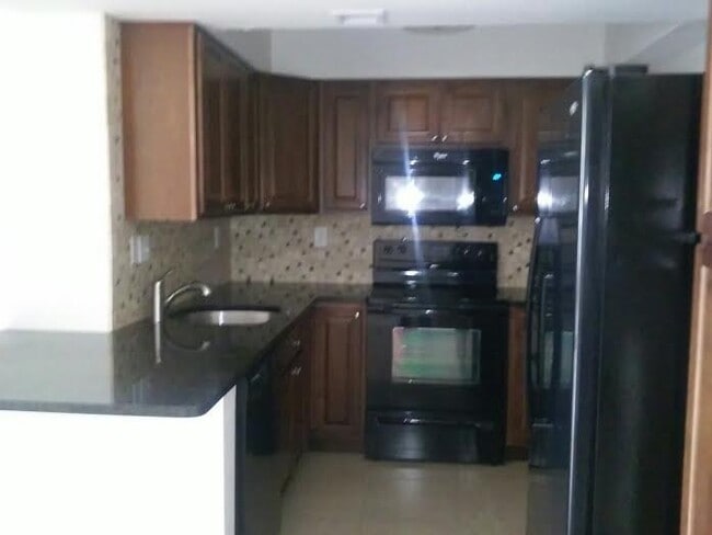 Building Photo - TWO BEDROOM TWO BATHROOM!! WATERFRONT COMMUNITY!!! Unit 24