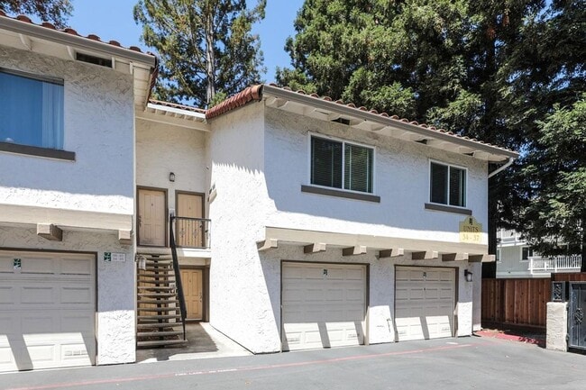 Building Photo - Large Condo with A/C, Balcony, 1 Car Garag...