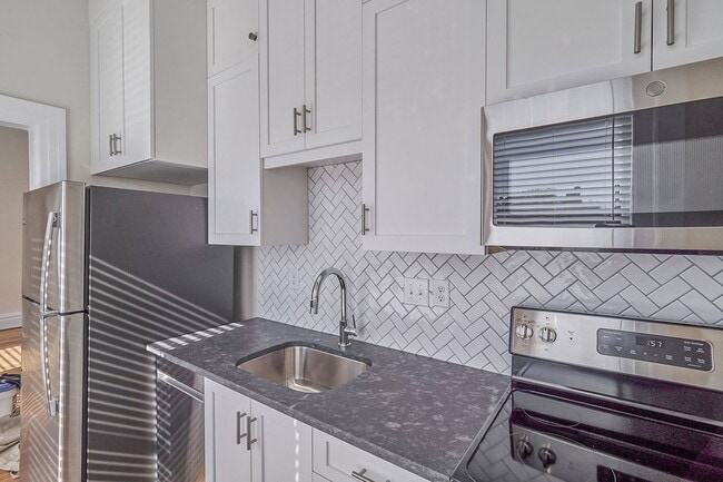 Building Photo - 1840 Monument Ave Unit Apt 5
