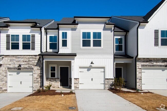 Building Photo - Luxurious 3-Bedroom Townhome Living in the...