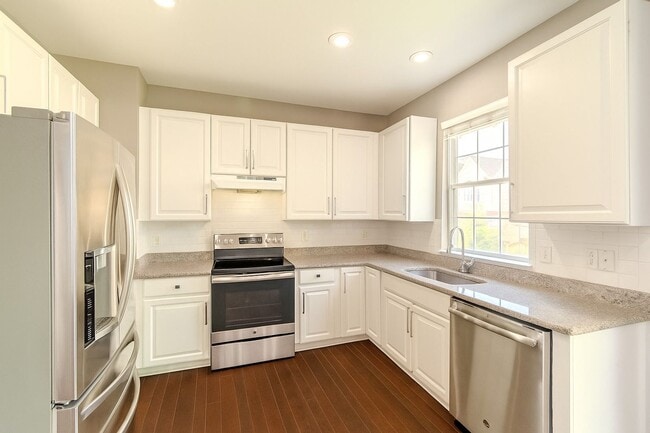 Photo - Stunning 2BR/2.5BA Townhouse with Dual Primary Suites, 2-Car Garage & Bonus Loft