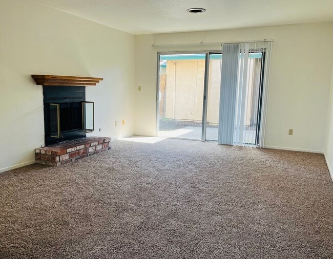 Photo - Spacious 2 Bedroom/2 bath duplex with a 2 car garage and laundry hook ups in a great North Modest...