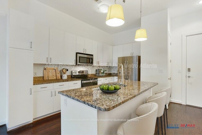 Photo - 711 Cosmopolitan Dr NE Unit 105