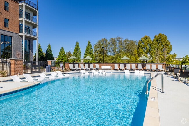 Resort Inspired Pool With Seating
