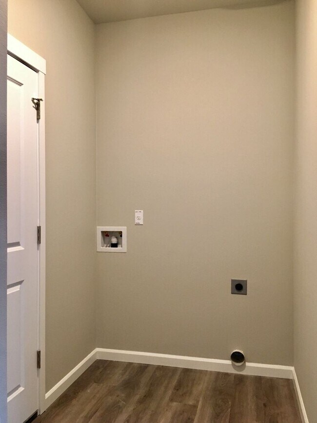 Photo - Well-Appointed 4BR/2.5BA Home with Spacious Living Areas & Modern Kitchen