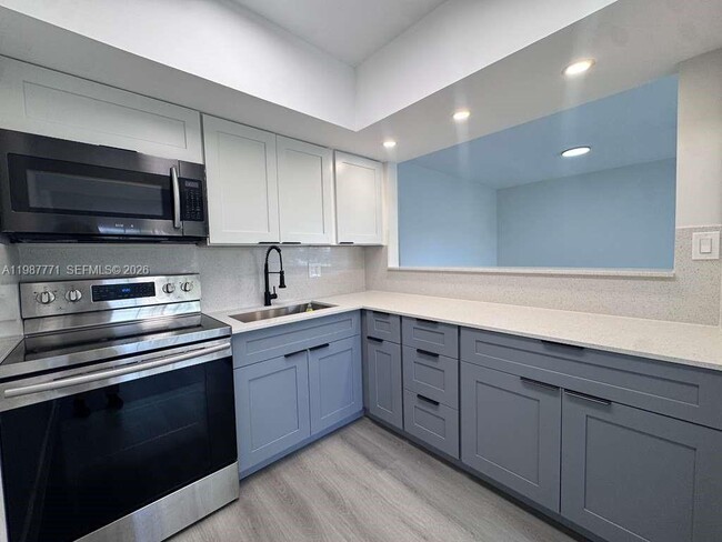 Photo - 455 Golden Isles Dr Unit 203