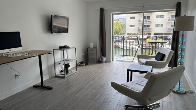 Building Photo - 3642 NE 171 St Unit 203