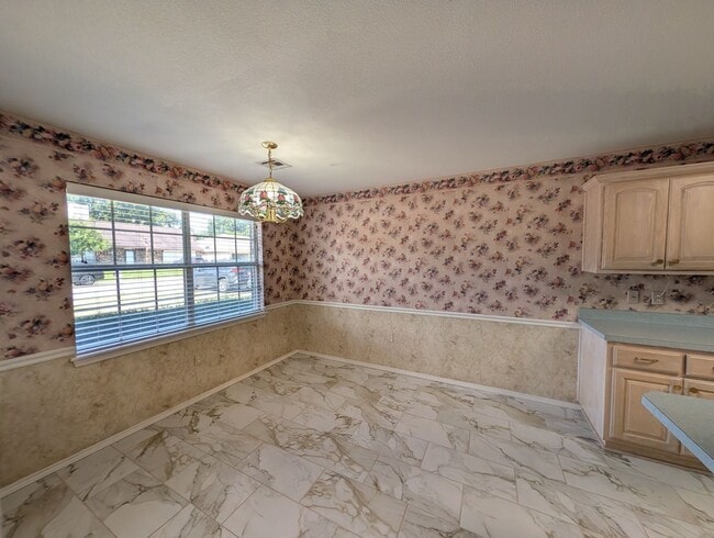 Photo - Spacious 3-Bedroom Duplex with Modern Comforts and Room to Roam!