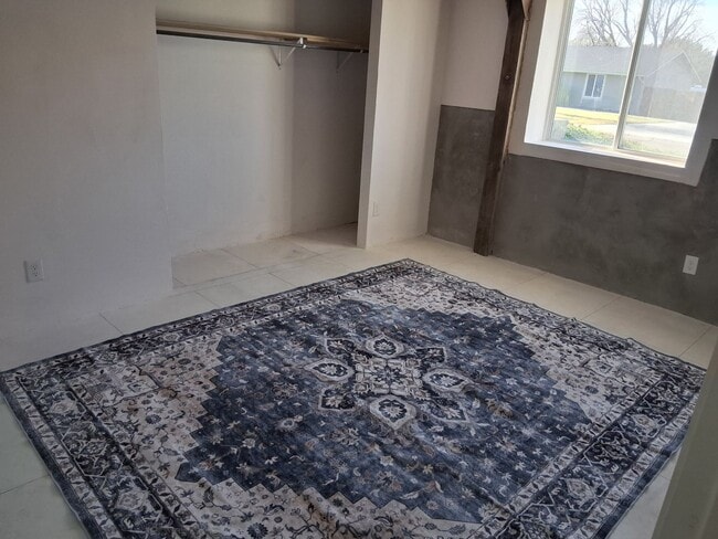 Photo - Large duplex with 3 car garage and made for blue collar folks.