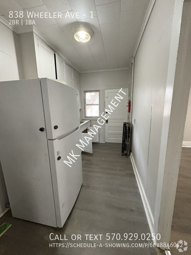 Building Photo - 2 bedrooms/1 bathroom Unit 1 Rental