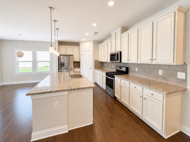 Photo - Better Than New | Ranch Home with Flex Room, 3-Head Spa Shower, Covered Outdoor Living & Premium ...
