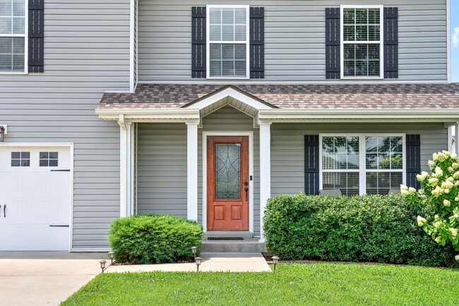 Photo - Spacious 4-Bedroom Home with Modern Upgrad...